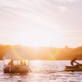 a sunset over a body of water