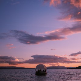 a sunset over a body of water